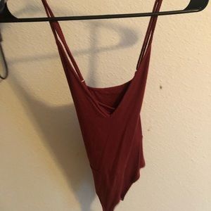 Burnt orange body suit